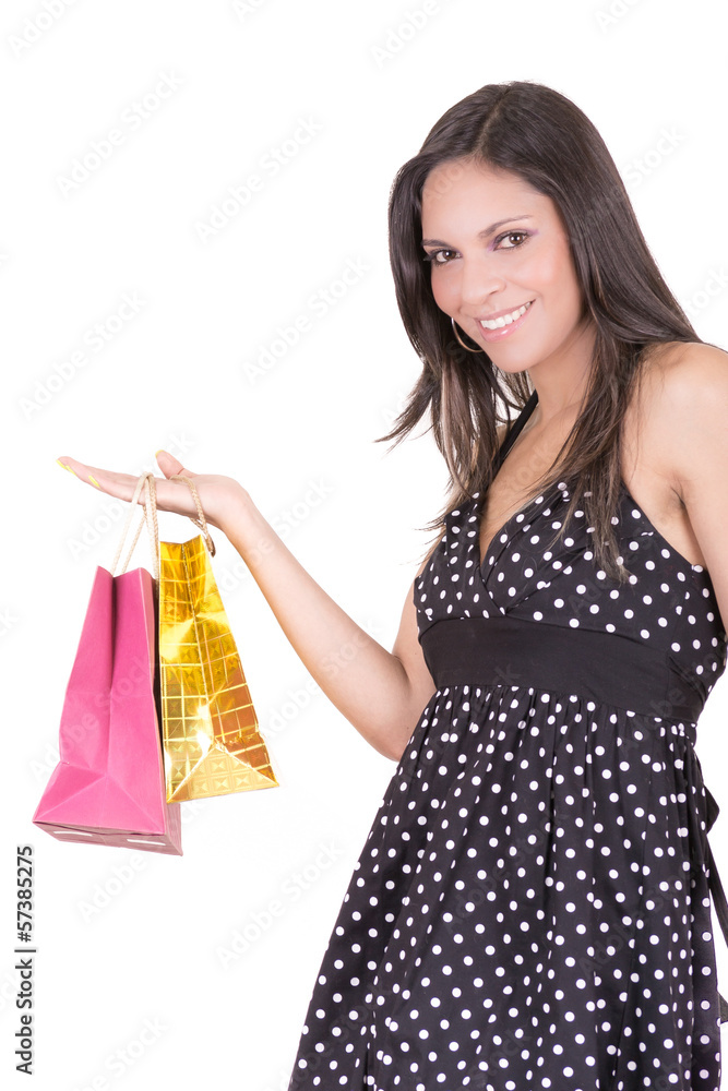 Happy hispanic female shopper holding shopping bags - isolated Happy hispanic female shopper holding shopping bags - isolated