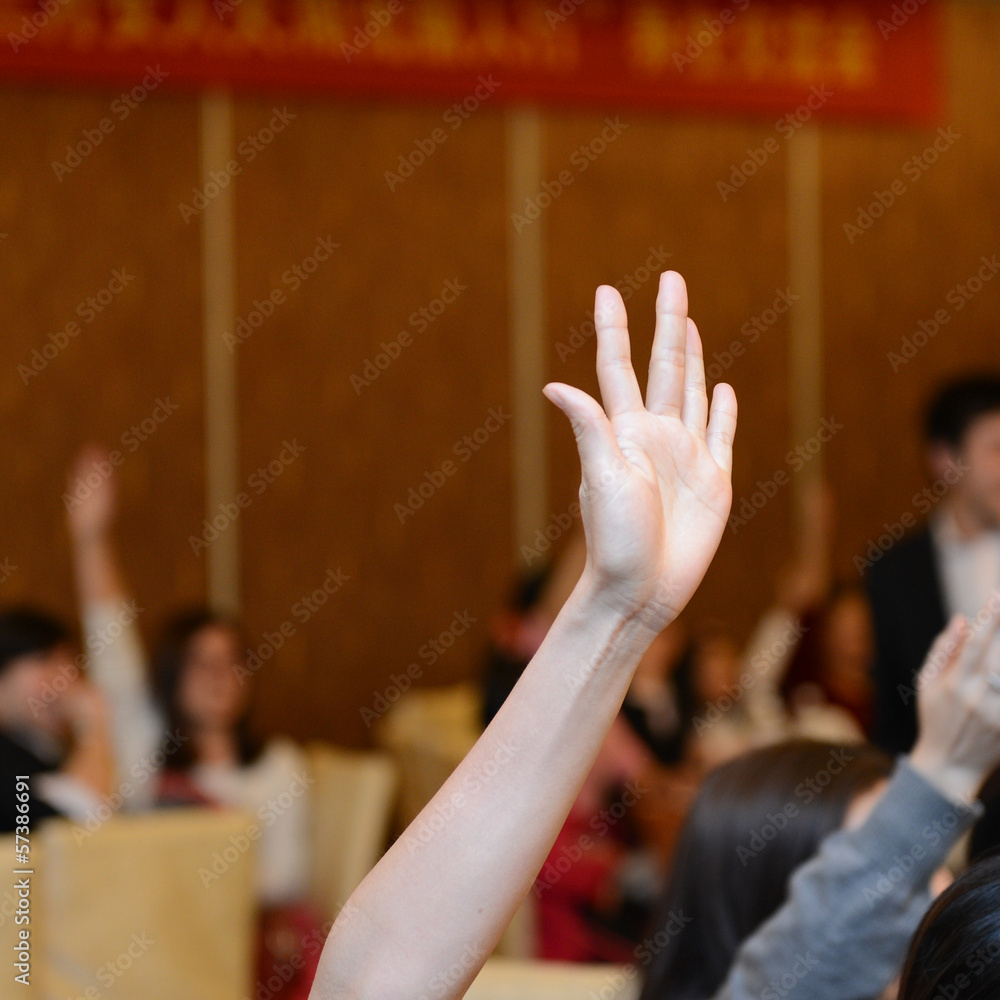 Obraz premium Raised hands