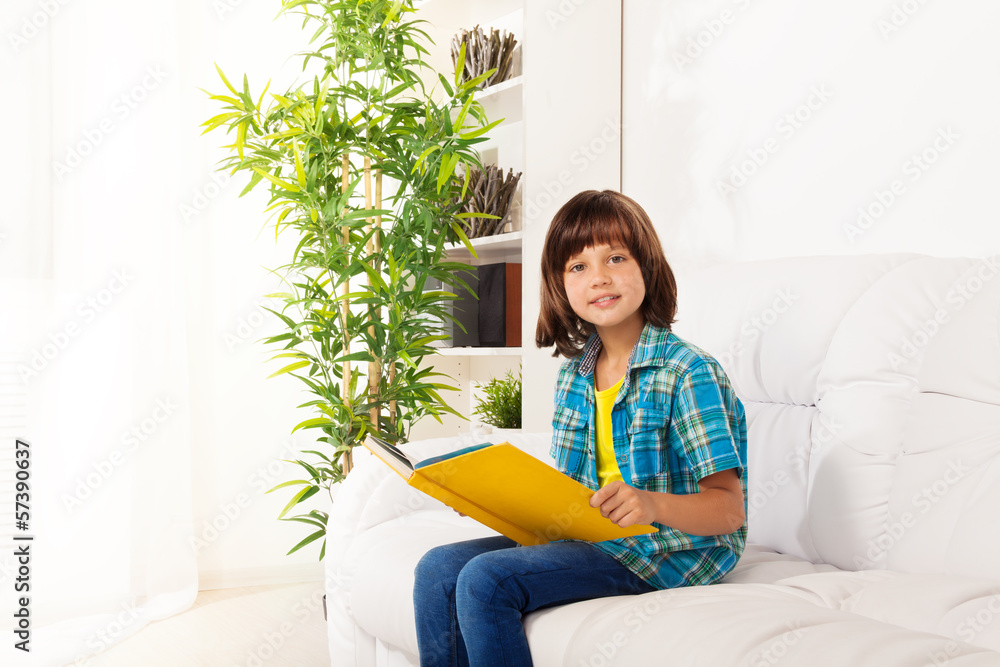 Little boy sit with book and reading Little boy sit with book and reading