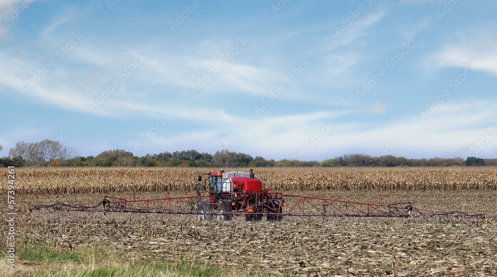 Fototapeta premium Spraying Farm Field
