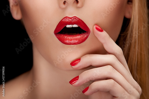 Red Sexy Lips and Nails closeup.
