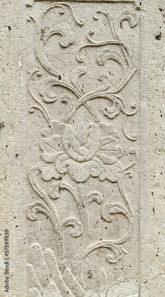 old stone carving background on temple fence wall