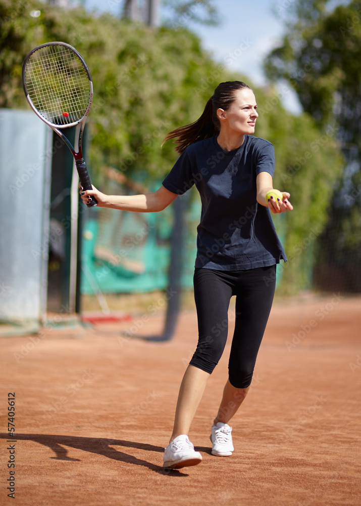 Tennis player executing a forehand