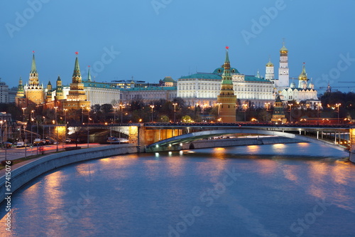 Moscow Kremlin and bridge through Moscow River at night