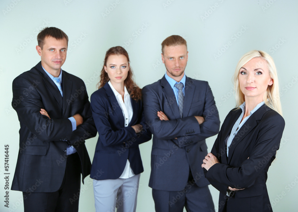 Group of business people on gray background Group of business people on gray background