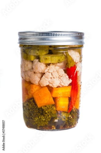 Mixed pickled vegetables in mason jars