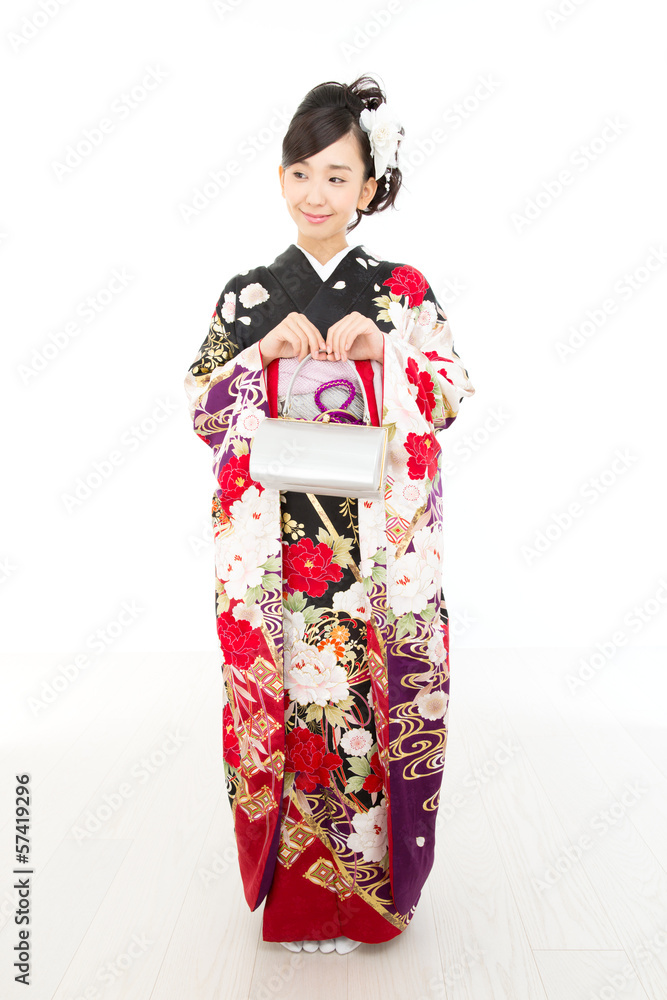 Beautiful asian kimono woman on white background Beautiful asian kimono woman on white background