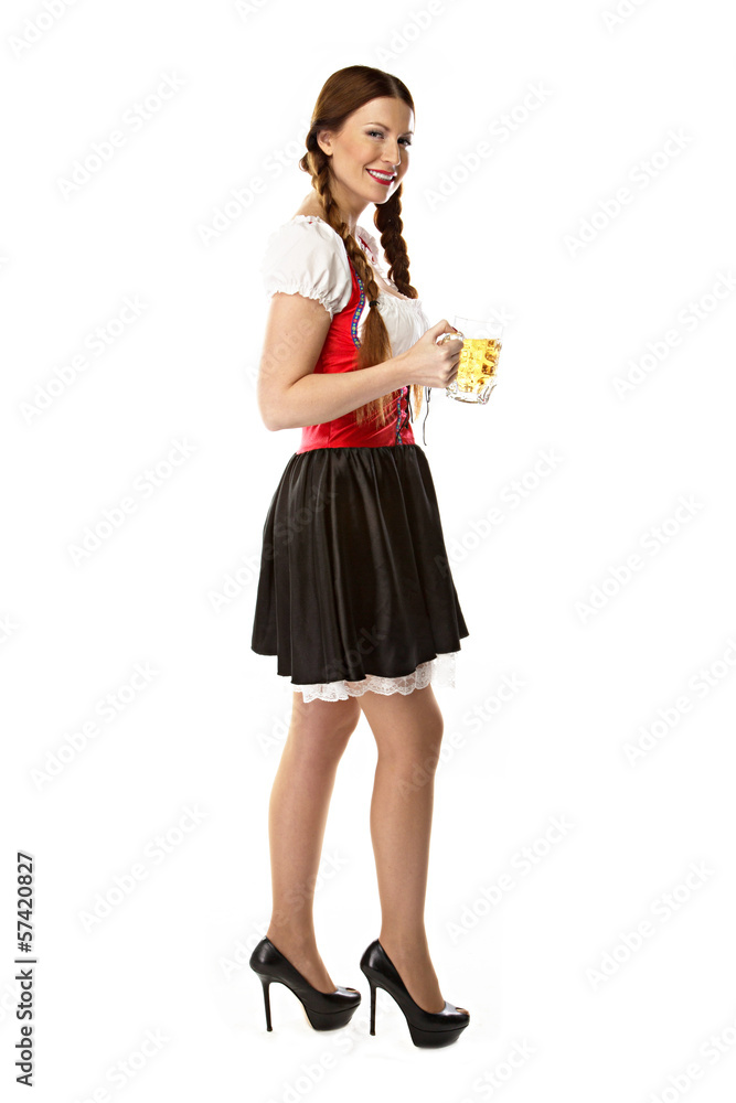 young and beautiful woman in a traditional Bavarian dress young and beautiful woman in a traditional Bavarian dress