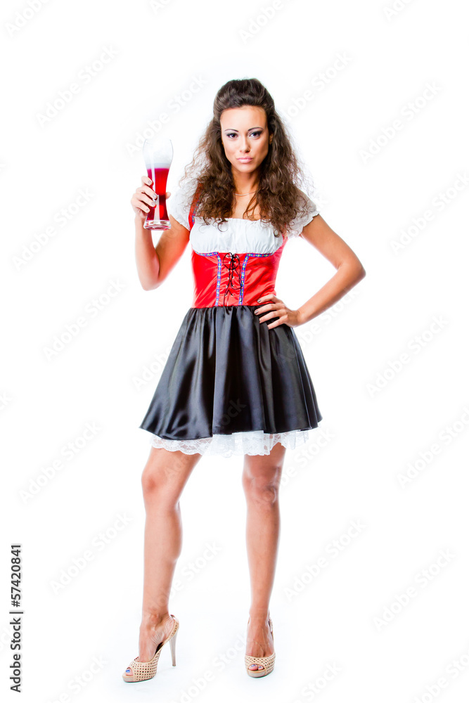 young and beautiful woman in a traditional Bavarian dress young and beautiful woman in a traditional Bavarian dress