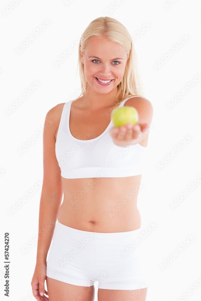 Gorgeous woman holding an apple Gorgeous woman holding an apple