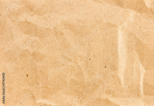Фотография Crumpled  recycled paper  background texture. Vintage craft pape