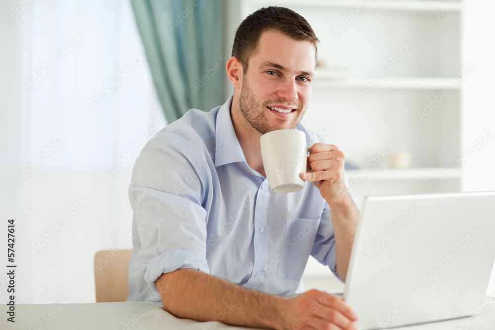 Businessman enjoying a cup of coffee Businessman enjoying a cup of coffee