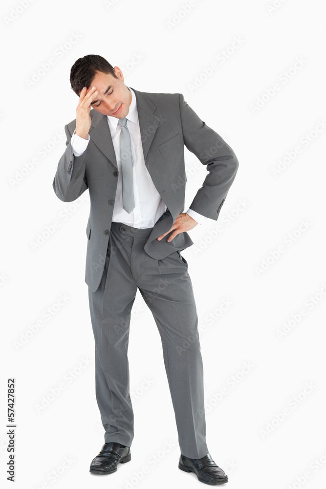 Businessman experiencing a setback Businessman experiencing a setback