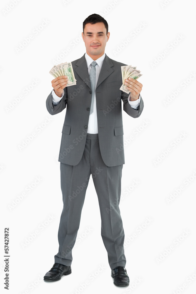 Successful businessman presenting banknotes Successful businessman presenting banknotes