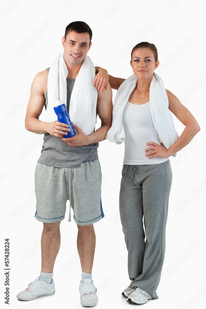 Portrait of a young couple going to practice sport Portrait of a young couple going to practice sport