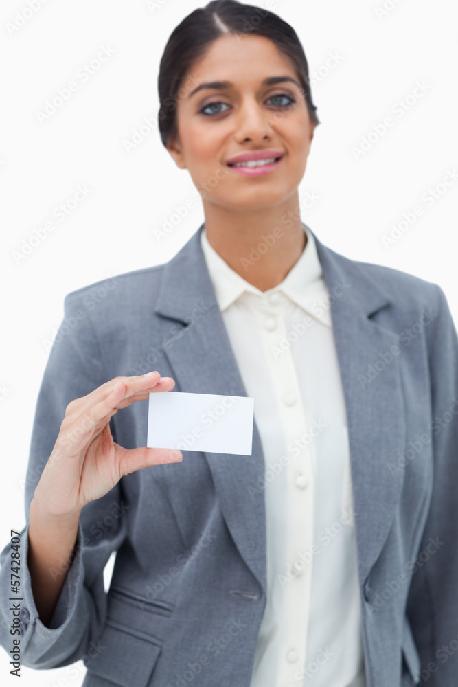 Tradeswoman showing blank business card Tradeswoman showing blank business card