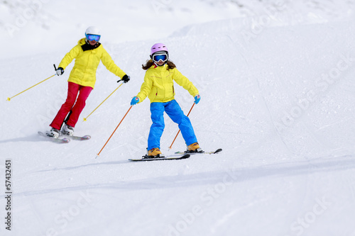 Skiing - child skiing downhill, ski lesson