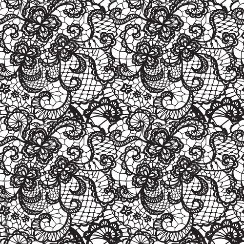 Lace black seamless pattern with flowers on white background © comotomo