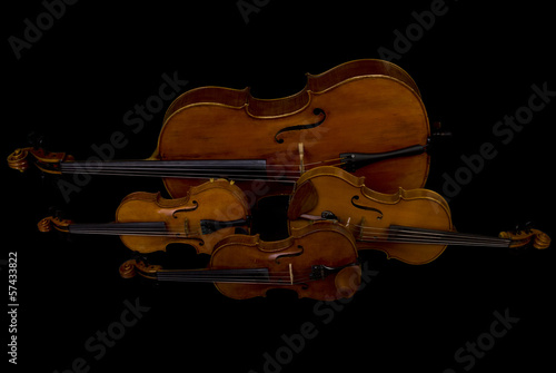 Two Violins, Viola and Cello isolated on black