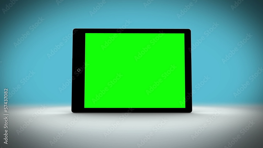 Tablet with green screen on changing background Tablet with green screen on changing background