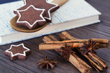 Cookies, star anise, cinnamon and cookbook
