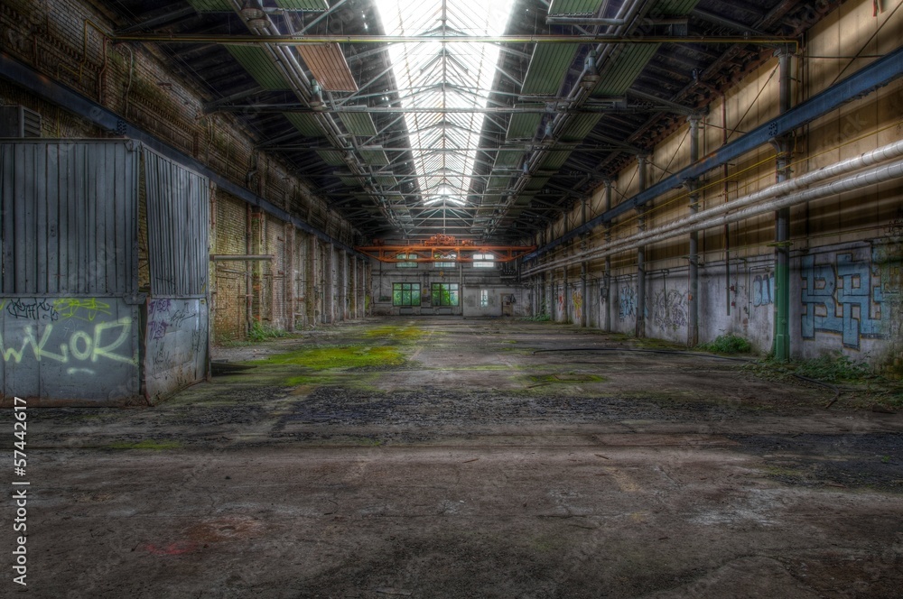 Old abandoned hall with long windows