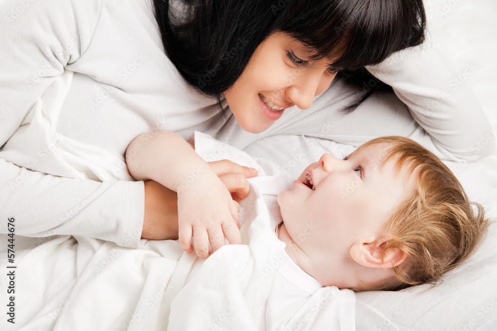 happy family. Mother with baby playing and smiling happy family. Mother with baby playing and smiling