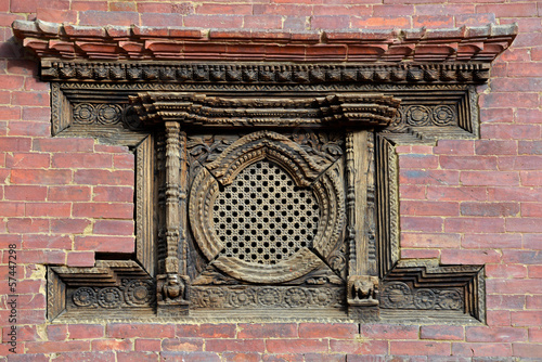 Carved wooden window on the Royal Palace. Patan, Nepal photo