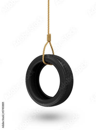 Tire swing isolated on white background photo
