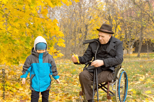 Disabled grandfather playing with his grandson © kolotype