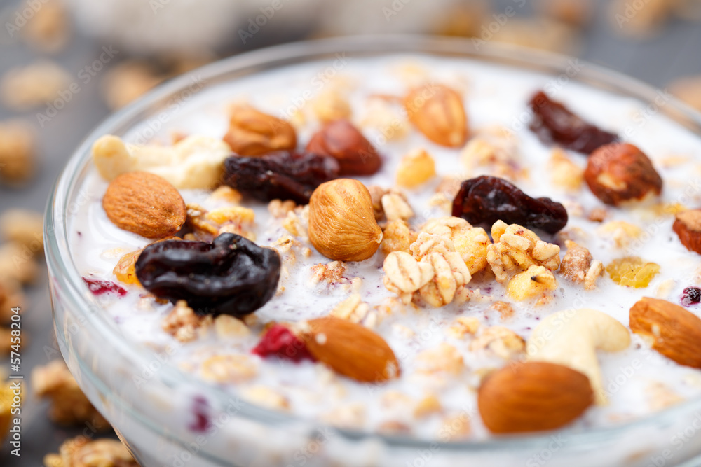 Healthy muesli breakfast with nuts and raisin