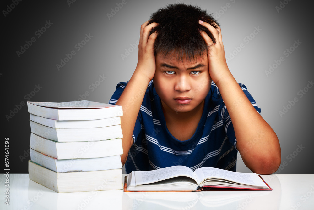 Angry asian boy with learning difficulties Angry asian boy with learning difficulties