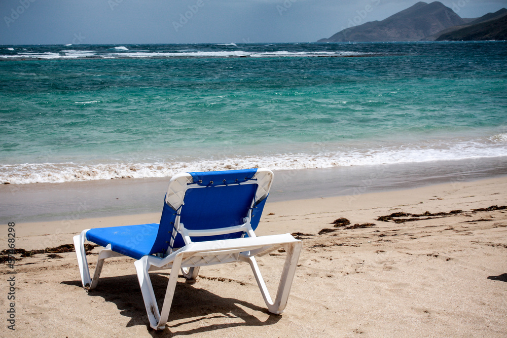 beautiful sunny beach with deckchair beautiful sunny beach with deckchair