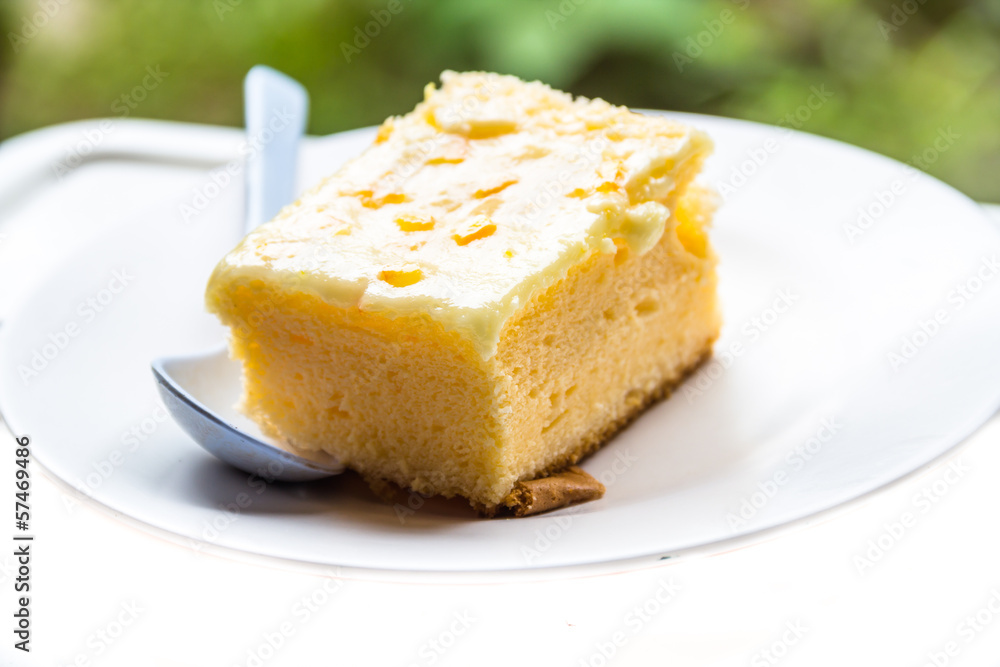 Cakes on a white dish is eaten. Cakes on a white dish is eaten.