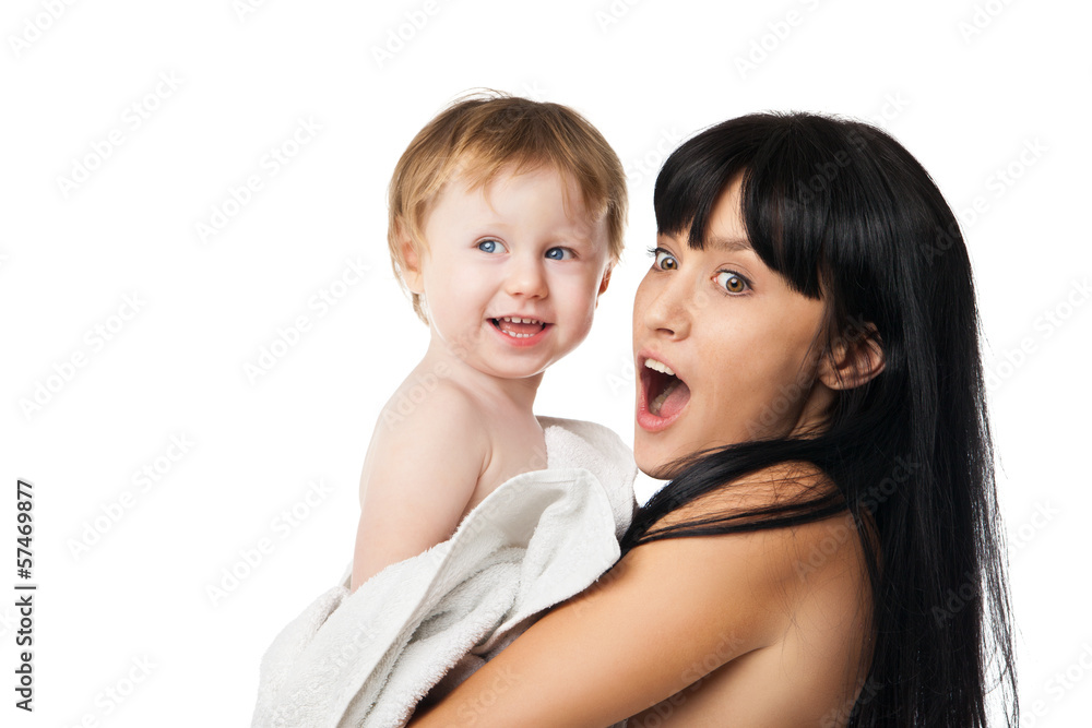 Mother with her baby after bathing in white towel Mother with her baby after bathing in white towel
