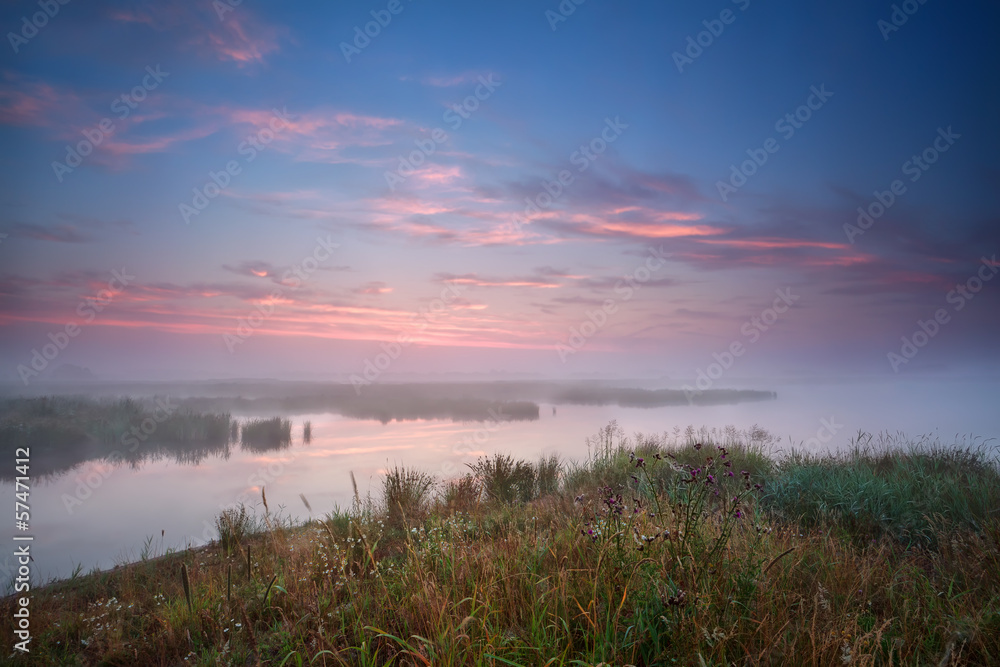 foggy sunrise over river
