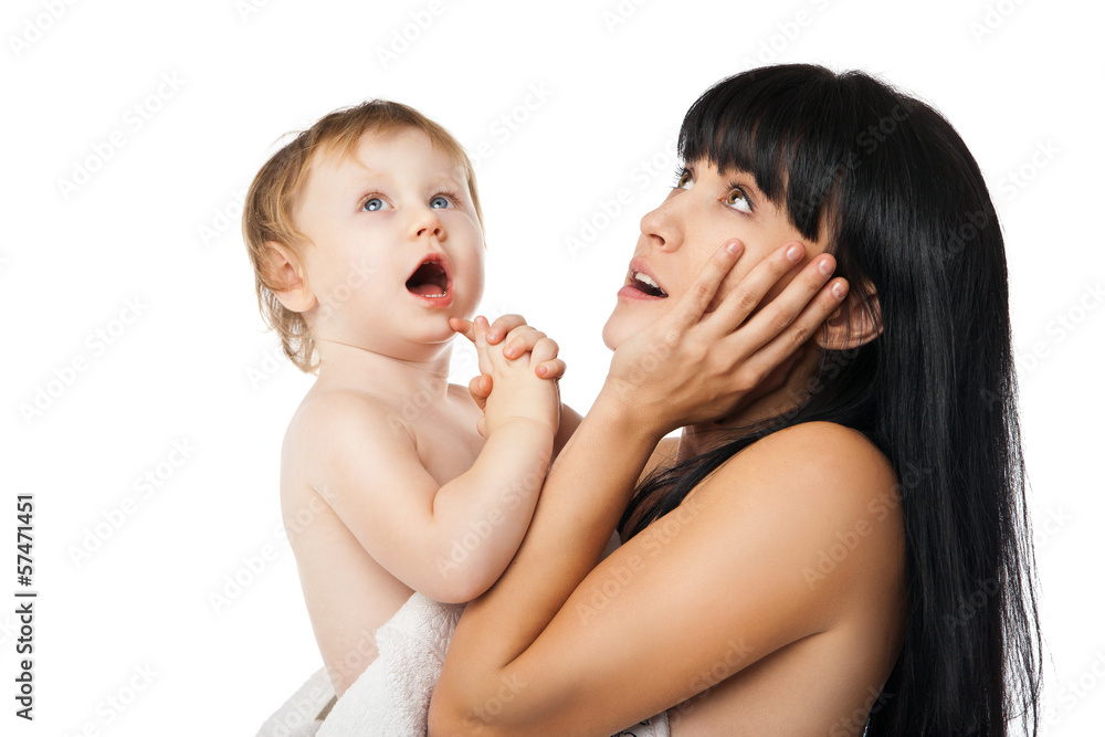 Mother with her baby after bathing in white towel Mother with her baby after bathing in white towel