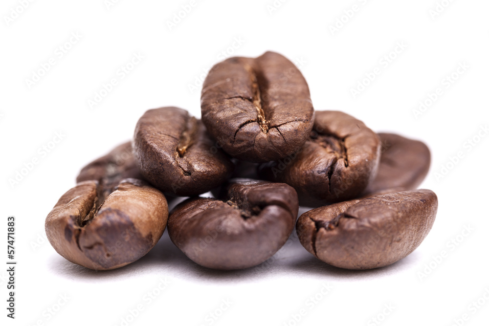 Heap of coffee beans isolated on white background Heap of coffee beans isolated on white background