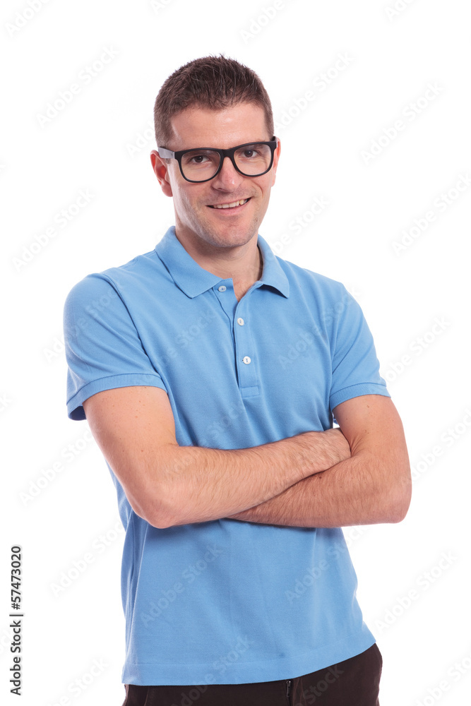 casual man with hands crossed smiles for you casual man with hands crossed smiles for you