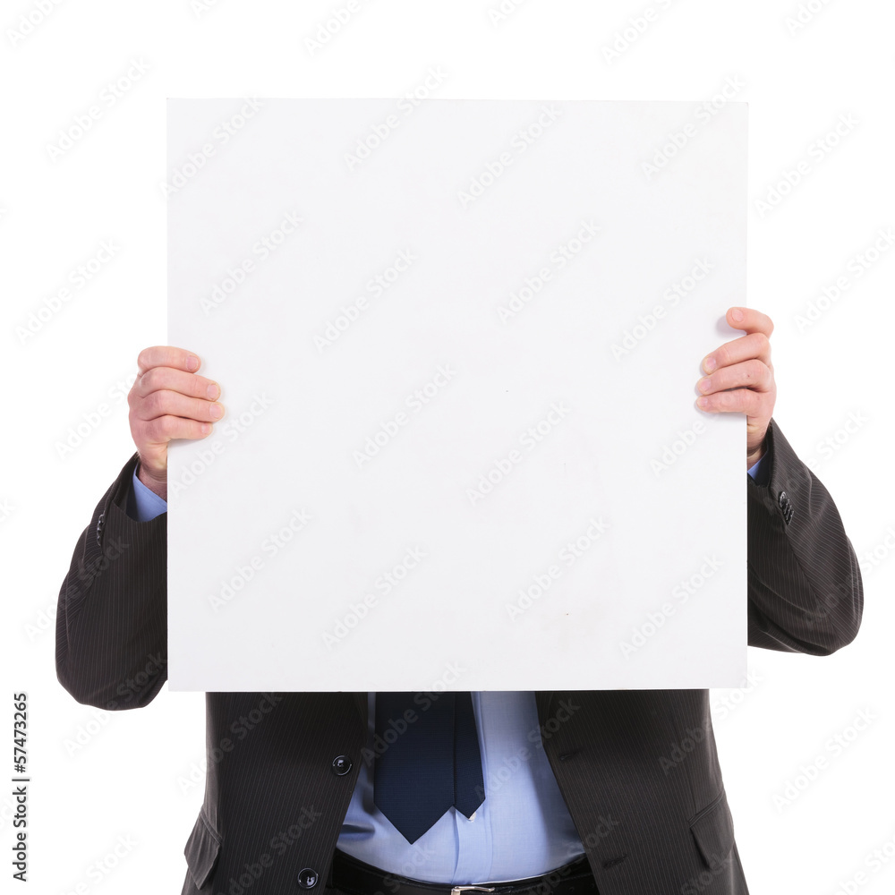 business man holds a pannel in front of his face business man holds a pannel in front of his face