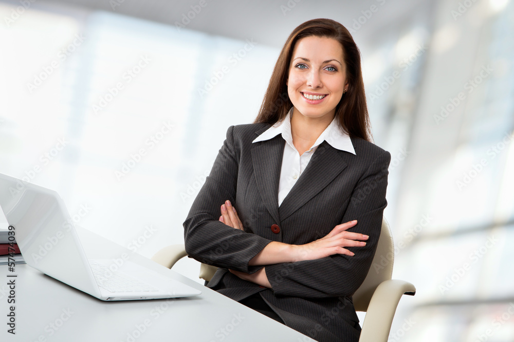 Business woman working with laptop Business woman working with laptop
