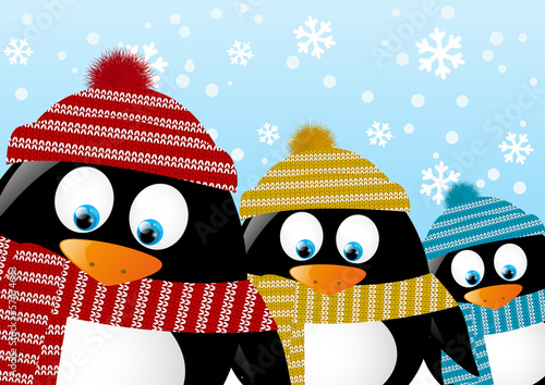 Cute penguins on winter background