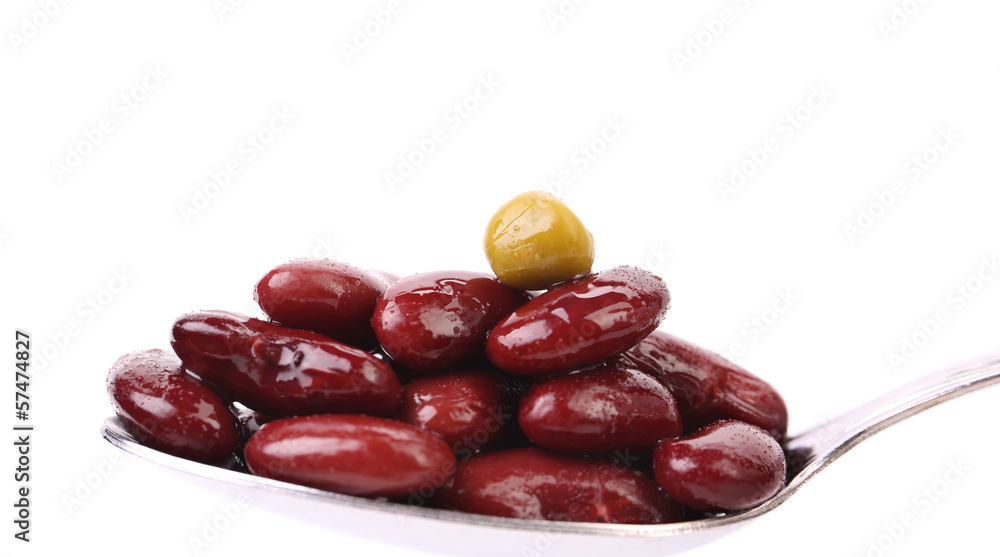 Preserve beans on a spoon. Preserve beans on a spoon.