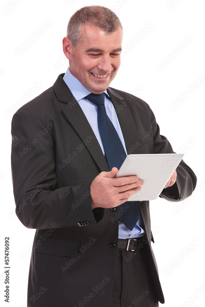 business man reading on his tablet business man reading on his tablet