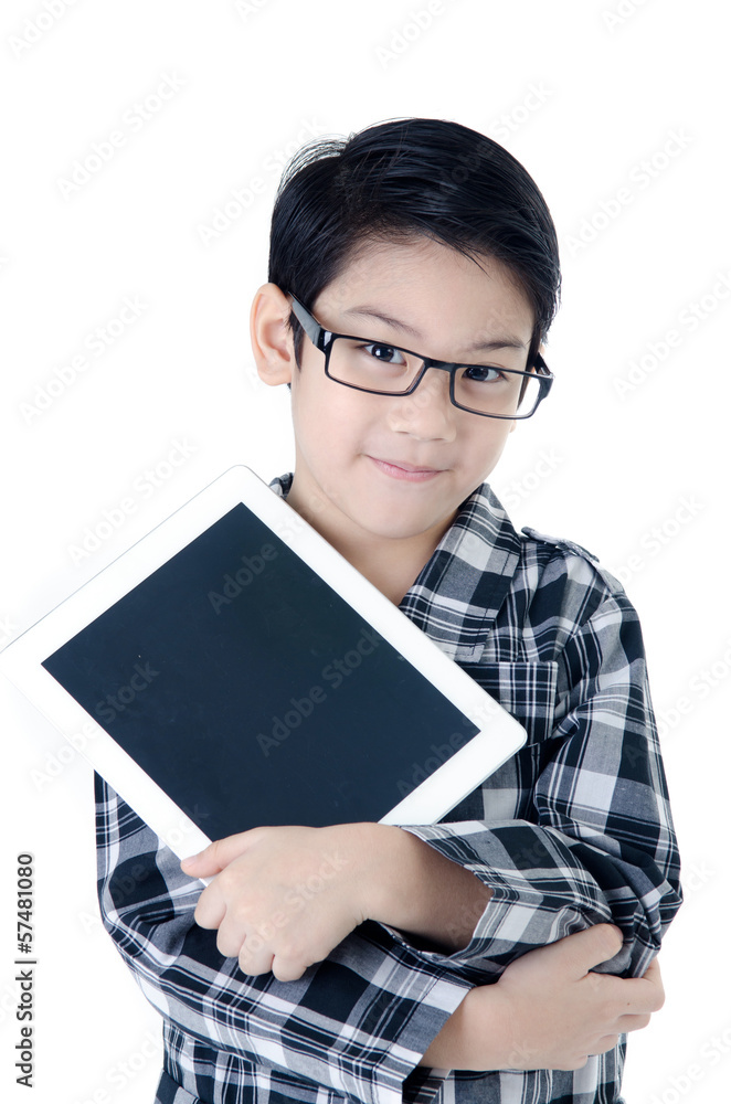 Cute asian Thailand boy with tablet computer on isolated backgro Cute asian Thailand boy with tablet computer on isolated backgro