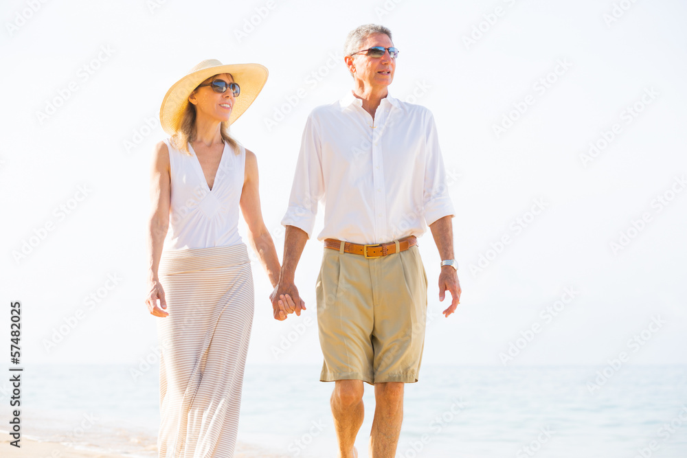 Romantic Couple Walking on the Beach Romantic Couple Walking on the Beach