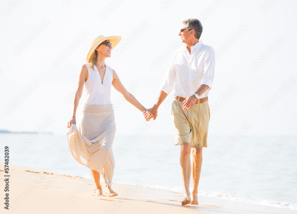 Romantic Couple Walking on the Beach Romantic Couple Walking on the Beach