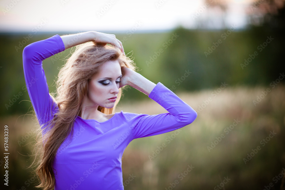 Young woman outdoors fashion portrait.