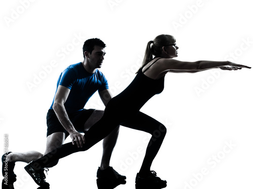 aerobics intstructor with mature woman exercising