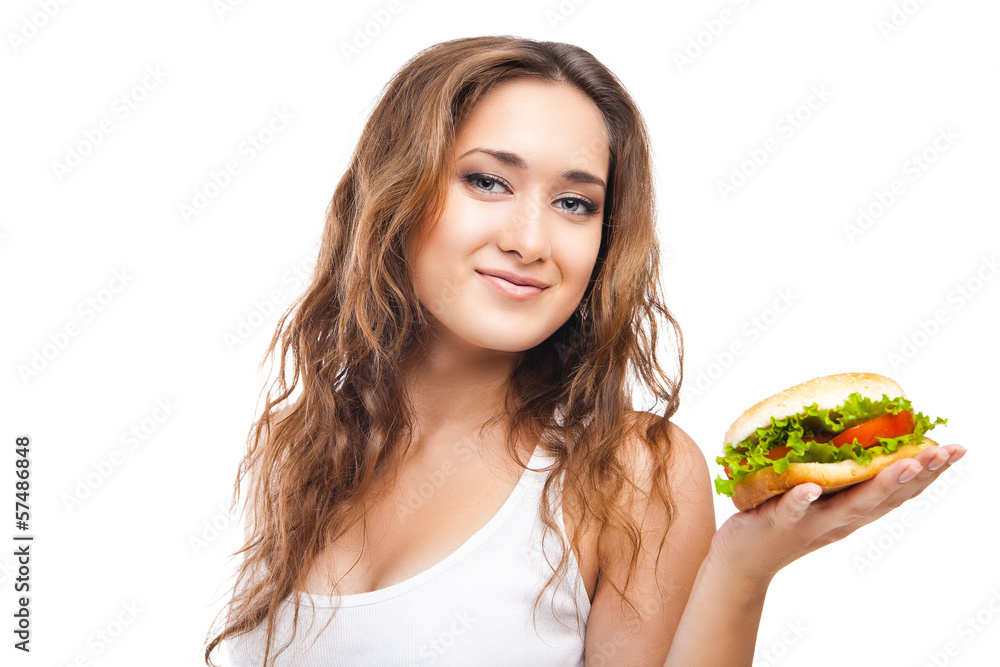 Happy Young Woman Eating big yummy Burger isolated Happy Young Woman Eating big yummy Burger isolated